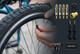 Bicycle valve inspection with Velo-Tool Presta valve cores, black tubeless valves and CO2 inflator.