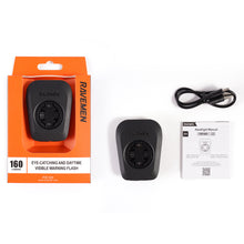 Ravemen bike light with packaging, cable, and manual on a white background