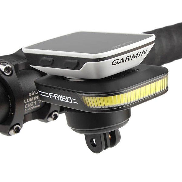 Garmin device mounted on a Ravemen front light handlebar with a white background
