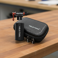 VELO-TOOL bike tool kit on a wooden surface